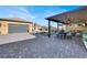 Large backyard patio with seating area and outdoor kitchen at 7036 Winstar St # A, Las Vegas, NV 89131