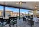 Outdoor patio with seating area, dining table, and ceiling fan at 7036 Winstar St # A, Las Vegas, NV 89131