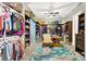Spacious walk-in closet with ample shelving and hanging space at 7036 Winstar St # A, Las Vegas, NV 89131