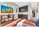 Wet bar with dark cabinets and granite countertop at 7036 Winstar St # A, Las Vegas, NV 89131