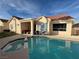 Inviting backyard oasis with pool, spa, and patio at 8545 Summer Vista Ave, Las Vegas, NV 89145