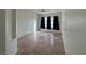 Spacious bedroom with tile flooring, ceiling fan, and large windows at 8545 Summer Vista Ave, Las Vegas, NV 89145