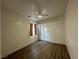 Well-lit bedroom with ceiling fan and double closet at 8545 Summer Vista Ave, Las Vegas, NV 89145