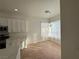 Bright dining room with large windows and chandelier at 8545 Summer Vista Ave, Las Vegas, NV 89145
