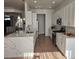 Modern kitchen with white cabinets and stainless steel appliances at 8545 Summer Vista Ave, Las Vegas, NV 89145