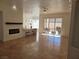 Spacious living area with hardwood floors and patio access at 8545 Summer Vista Ave, Las Vegas, NV 89145