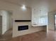 Bright living room with fireplace and sliding doors to backyard at 8545 Summer Vista Ave, Las Vegas, NV 89145