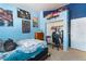 Bedroom with double bed, closet, and workspace at 925 Dulcet Dr, North Las Vegas, NV 89032