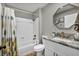 Bright bathroom features a tub and shower combo with modern fixtures and decor at 9321 January Dr, Las Vegas, NV 89134