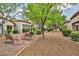 Landscaped walkways and benches offer residents peaceful outdoor space at 9321 January Dr, Las Vegas, NV 89134