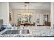 Open dining area featuring a stylish light fixture and granite countertops at 9321 January Dr, Las Vegas, NV 89134