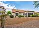 Charming house with well-maintained desert landscaping and a beautiful tiled roof at 9321 January Dr, Las Vegas, NV 89134