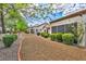Beautiful home exterior featuring manicured landscaping and charming walkways at 9321 January Dr, Las Vegas, NV 89134
