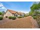 Beautiful single-story home with well-maintained landscaping and tile roof in quiet neighborhood at 9321 January Dr, Las Vegas, NV 89134