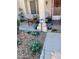Inviting front porch with comfortable seating and decorative blue plants at 9321 January Dr, Las Vegas, NV 89134