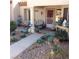 Charming front porch with seating area and well-maintained landscaping at 9321 January Dr, Las Vegas, NV 89134