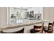 Beautiful kitchen with granite countertops and bar stool seating at the counter at 9321 January Dr, Las Vegas, NV 89134