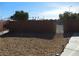 Fenced backyard with gravel landscaping and a secure gate for added privacy and security at , North Las Vegas, NV 89031