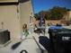 Backyard with patio furniture, trash cans, and AC unit at , North Las Vegas, NV 89031