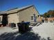 Large backyard with gravel, picnic table, and trash cans at , North Las Vegas, NV 89031