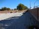 Large, open backyard with gravel and some plantings at , North Las Vegas, NV 89031
