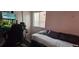 Compact bedroom featuring natural light, and a comfortable bed at , North Las Vegas, NV 89031