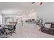 Bright living room with fireplace and view into kitchen at 2113 Diamond Brook Ct, Las Vegas, NV 89117