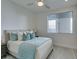 Bright bedroom with light flooring and a comfortable bed at 2631 Mystere Ct, Las Vegas, NV 89117