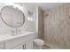 Updated bathroom with walk-in shower, modern vanity, and stylish fixtures at 2820 Lotus Hill Dr, Las Vegas, NV 89134