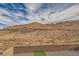 Landscaped backyard with mountain views at 284 Crimson Edge St, Henderson, NV 89012