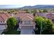 Two-story house with attached two-car garage, mountain views at 316 Pleasant Summit Dr, Henderson, NV 89012