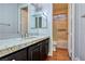Bathroom with granite countertop, dark wood vanity, and tiled shower at 316 Pleasant Summit Dr, Henderson, NV 89012