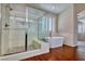 Spa-like bathroom with a large shower and a built-in bench at 316 Pleasant Summit Dr, Henderson, NV 89012