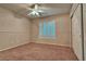 Bright bedroom with ceiling fan and window shutters at 316 Pleasant Summit Dr, Henderson, NV 89012