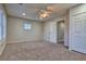 Large bedroom with ceiling fan and window shutters at 316 Pleasant Summit Dr, Henderson, NV 89012