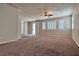 Spacious Primary bedroom with plush carpet and sliding door access at 316 Pleasant Summit Dr, Henderson, NV 89012