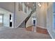 Two-story entryway with hardwood floors and a grand staircase at 316 Pleasant Summit Dr, Henderson, NV 89012