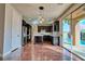 Modern kitchen with dark cabinets, granite counters, and island at 316 Pleasant Summit Dr, Henderson, NV 89012
