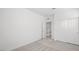 Cozy bedroom with neutral carpet, closet and access to hallway and ensuite bath at 334 Taylor St, Henderson, NV 89015