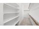 Walk-in closet with built-in shelving and hanging rods at 334 Taylor St, Henderson, NV 89015