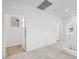 Upstairs hallway area with carpet, natural light and access to bedrooms and laundry room at 334 Taylor St, Henderson, NV 89015