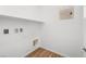Convenient laundry room area with hookups, shelving, and modern flooring at 334 Taylor St, Henderson, NV 89015