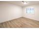 Spacious bedroom featuring light walls and wood-look floors at 336 Merit Ct, Henderson, NV 89014