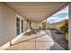 Covered patio with seating area and view of the backyard at 3817 Bach Way, North Las Vegas, NV 89032