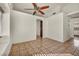 Dining area featuring tile floors and a ceiling fan at 3817 Bach Way, North Las Vegas, NV 89032