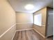 Bedroom with wood-look floors, neutral walls, and closet at 4348 Tara Ave # 2, Las Vegas, NV 89102