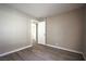 Bright bedroom with wood-look flooring and access to laundry at 4348 Tara Ave # 2, Las Vegas, NV 89102