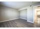 Bedroom with wood-look floors and views of kitchen at 4348 Tara Ave # 2, Las Vegas, NV 89102