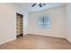 Bright bedroom with wood-look floors and spacious closet at 470 Pebble Run Ave, Henderson, NV 89011