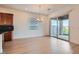 Bright dining room with sliding glass door to backyard at 470 Pebble Run Ave, Henderson, NV 89011